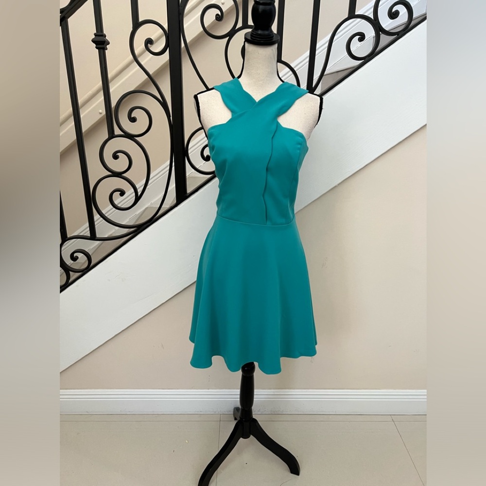 Adelyn Rae teal scallop trim crisscross neck dress!